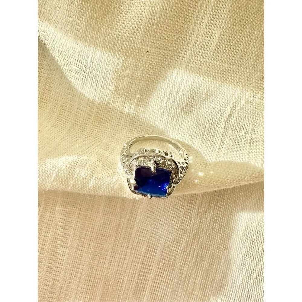 Bright blue cubic zirconia elongated radiant cut cocktail ring